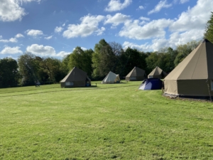 Year 7 and 8 pupils taking part in outdoor activities during Peak District residential camp
