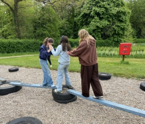 Year 7 and 8 pupils taking part in outdoor activities during Peak District residential camp