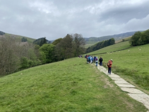 Year 7 and 8 pupils taking part in outdoor activities during Peak District residential camp